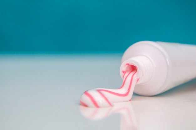 Photo dental care, oral care products close-up on a light green