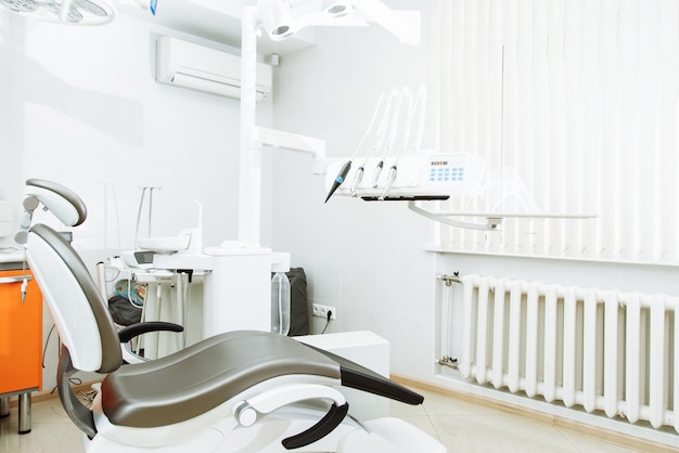 Dental clinic interior design with chair and tools