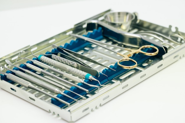 Dental implantation surgical set. Surgical kit of instruments used in dental implantology.