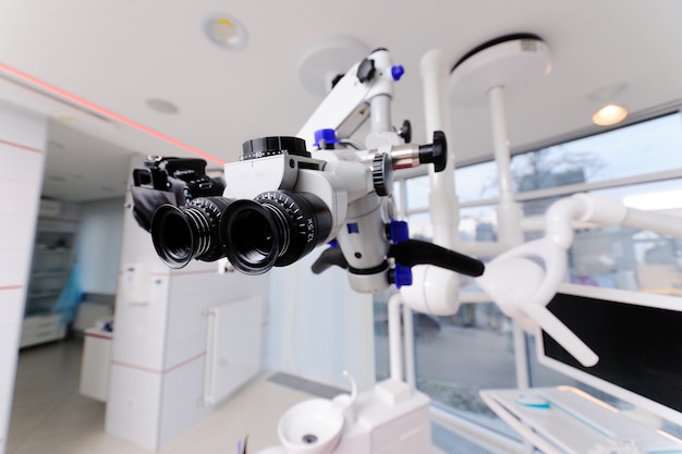 Dental Microscope on a background of a modern clinic