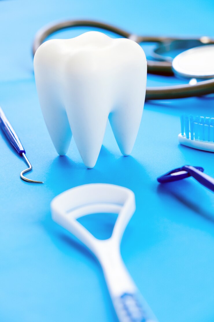 Dental model and dental equipment on blue