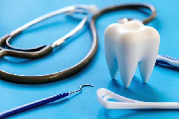 Dental model and dental equipment on blue