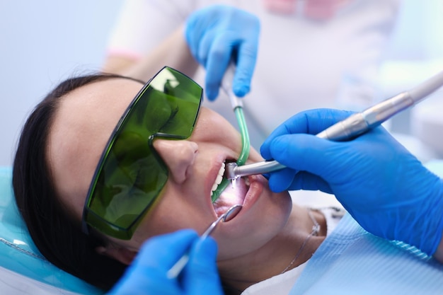 Dental team and patient at dentist's surgery