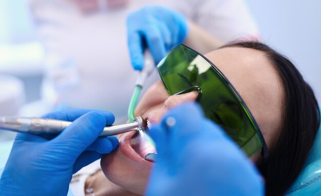 Dental team and patient at dentist's surgery