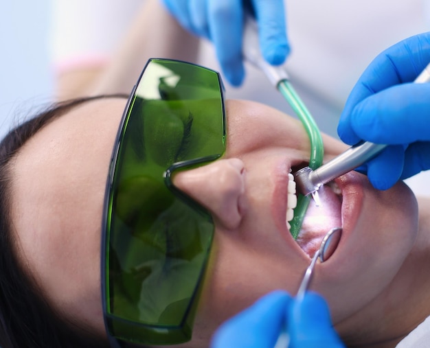 Dental team and patient at dentist's surgery