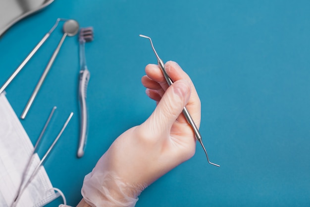 Dental tools on a blue background