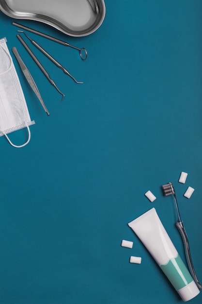 Dental tools on a blue background