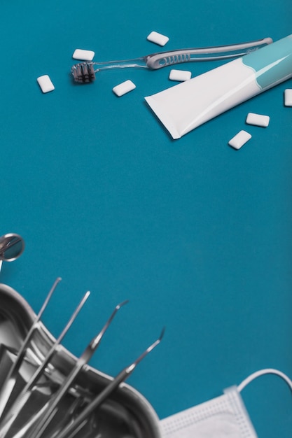 Dental tools on a blue background