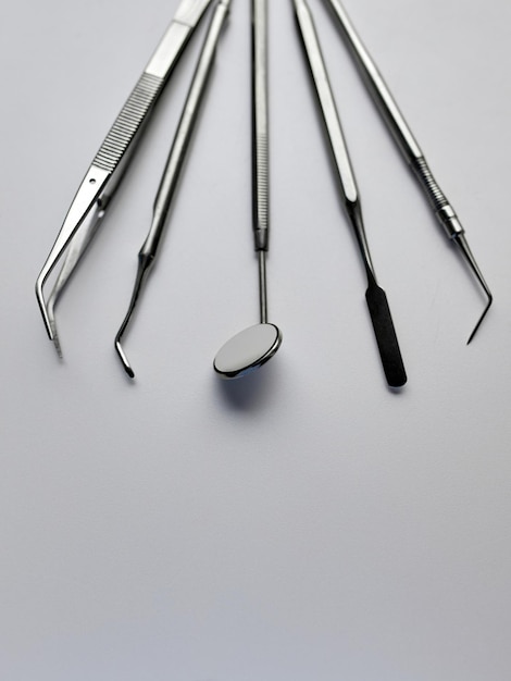 Photo dental tools in dental clinic teethcare dental health concept