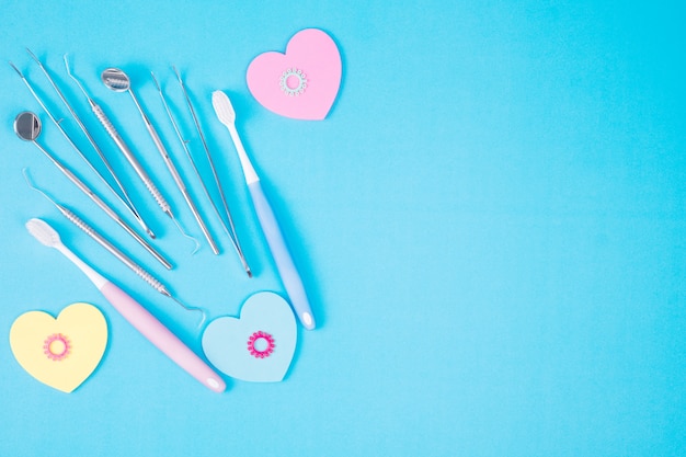 Dental tools use for dentist on the blue background