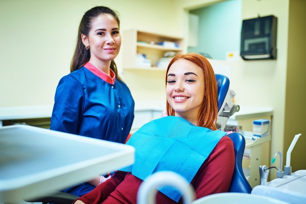 Dentist examining a patient's teeth in the dentist