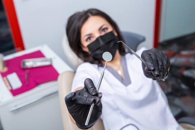 Dentist examining patient teeth in dental clinic Dentistry and healthcare