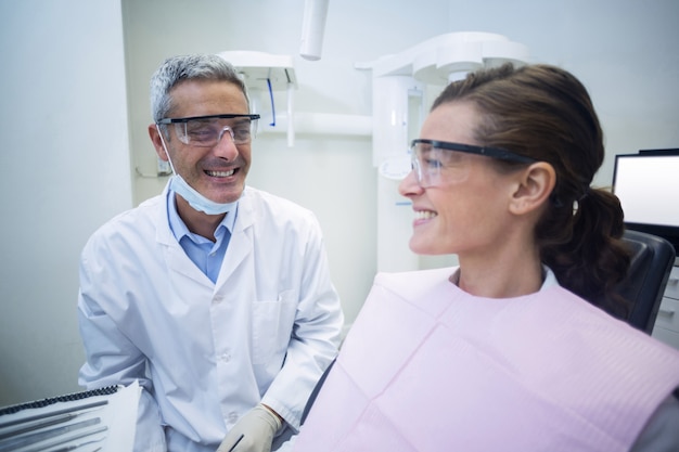 dentist interacting with patient