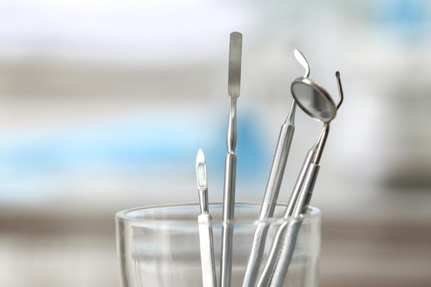 Dentist medical tools in glass