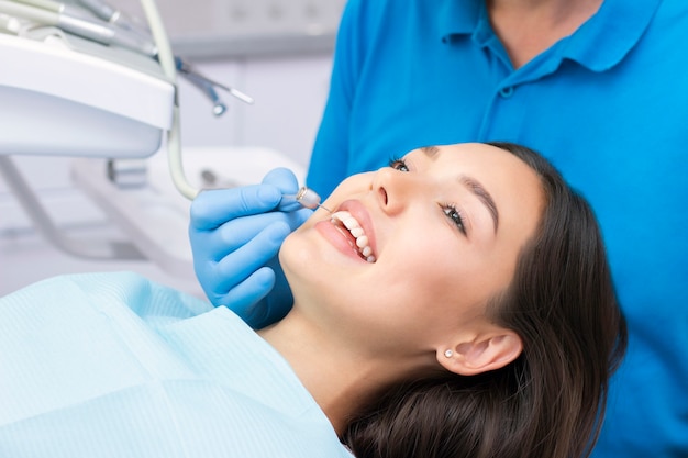 Dentist and patient in the dental office