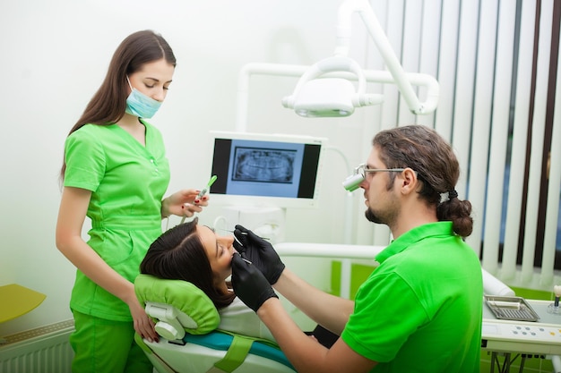 Dentist and patient in dentist office