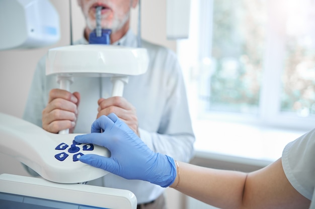 a dentist regulating switchboard of a panormaic x-ray machine