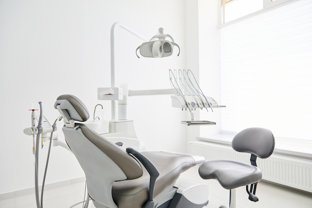dentist's office interior with modern chair and special dentisd equipment