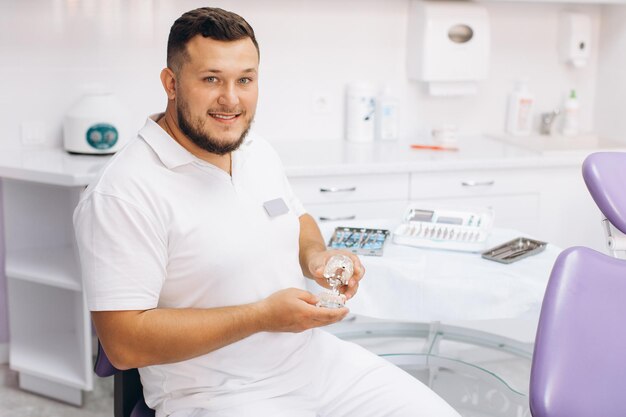 Dentist smiling at dental clinic