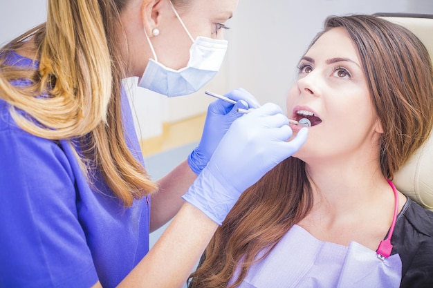 Dentist treating tooth