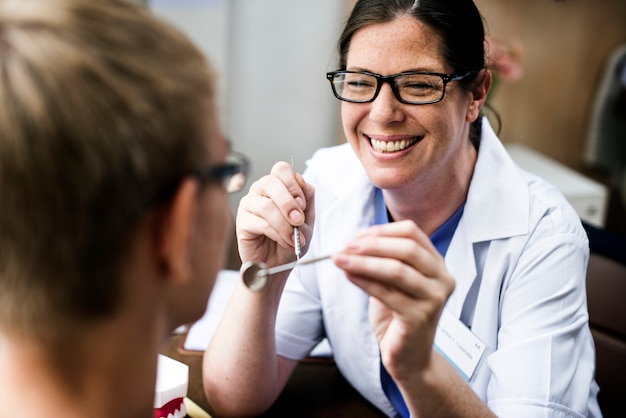 Dentist with her patient