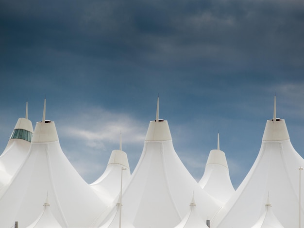 Denver International Airport well known for peaked roof. Design of roof is reflecting snow-capped mountains.