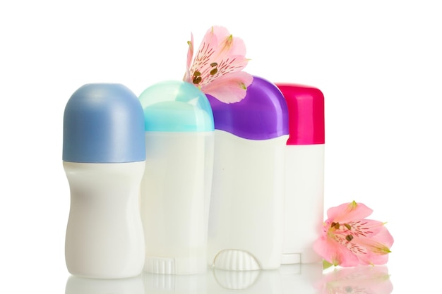 Deodorants with flowers isolated on white