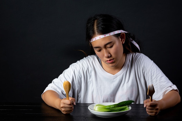 Depressed woman hungry from dieting