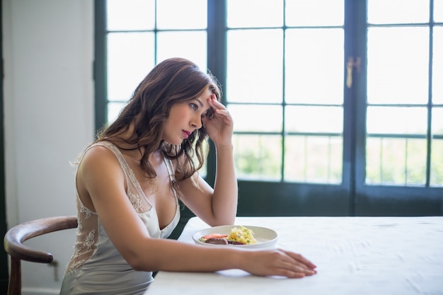 Depressed woman sitting