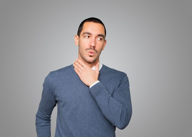 Depressed young man doing a gesture of stress