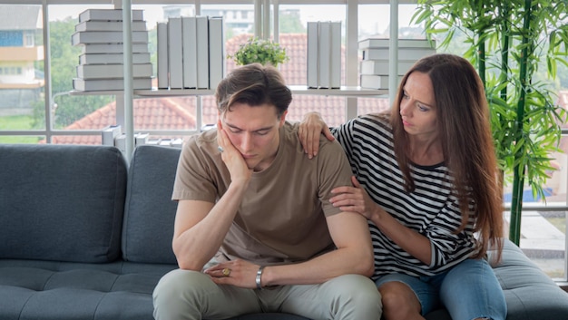 depression concept and encourage young man an anxious worried and bored look on his face