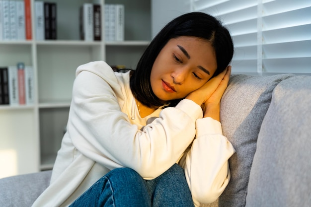 Depression and mental illness Asian woman disappointed sad after receiving bad news Stressed girl confused with unhappy problems arguing with boyfriend cry and worry about unexpected pregnancy