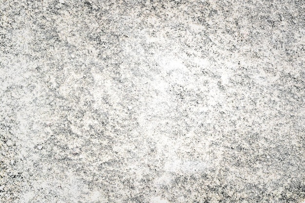 Desaturated gray rough concrete wall texture background