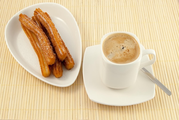 Desayuno tipico en Espana churros con cafe con leche
