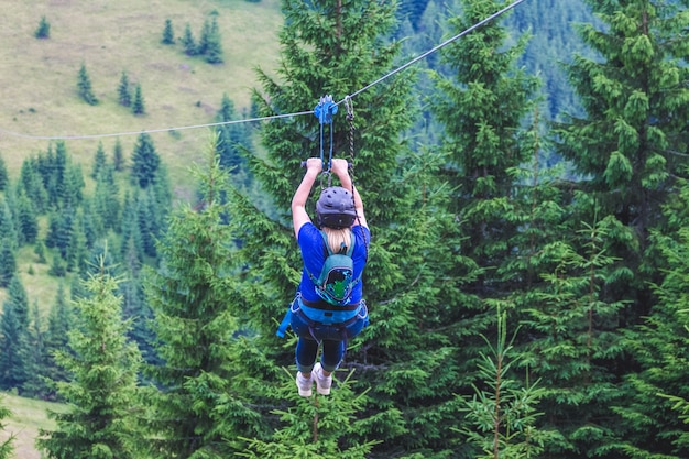 Descent from mountain on a metal cable