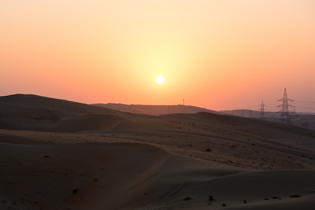 Desert dunes in Liwa, Abu Dhabi, United Arab Emirates during sunset