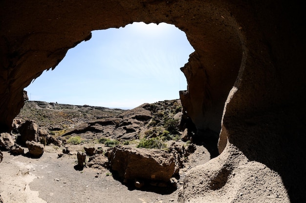 Photo desert landscape natural arch silhouette in tenerife canary islands spain