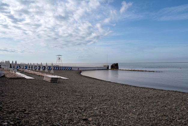 A deserted beach on the coast of Sochi and calm Black Sea Adler Krasnodar Territory Russia