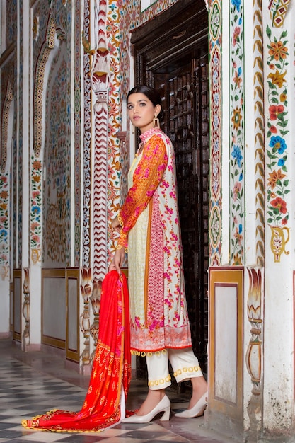 Desi Girl Side Pose Wearing Traditional Desi Dress for Photoshoot at Ancient Place