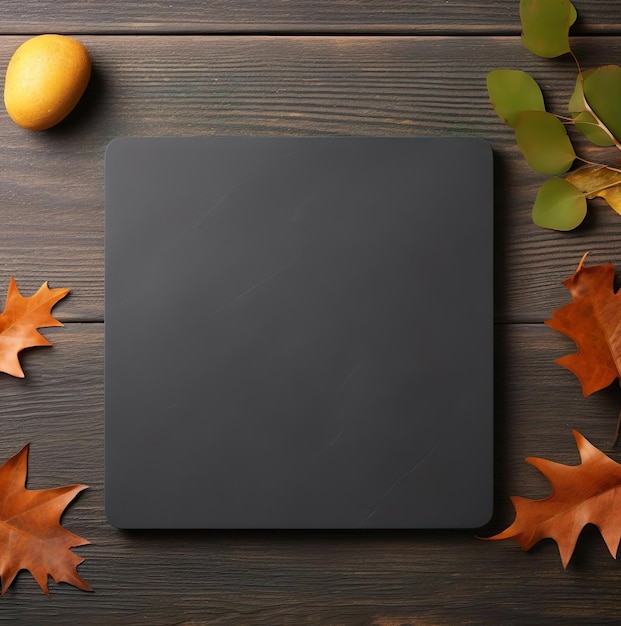 Design of black card template with autumn leaves decoration