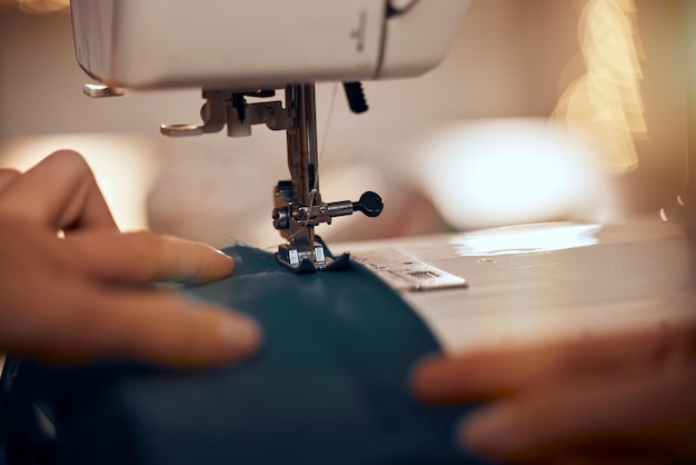 Design clothes and closeup of sewing machine with fabric for clothing production fashion design and tailor Manufacturing creative and hands of fashion designer working with textile in workshop