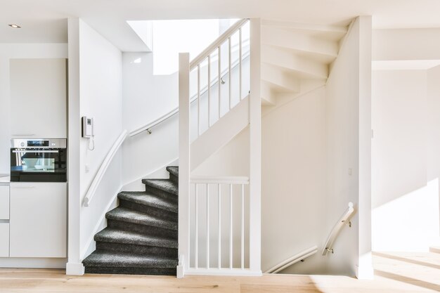 Designed in a minimalistic style staircase hall