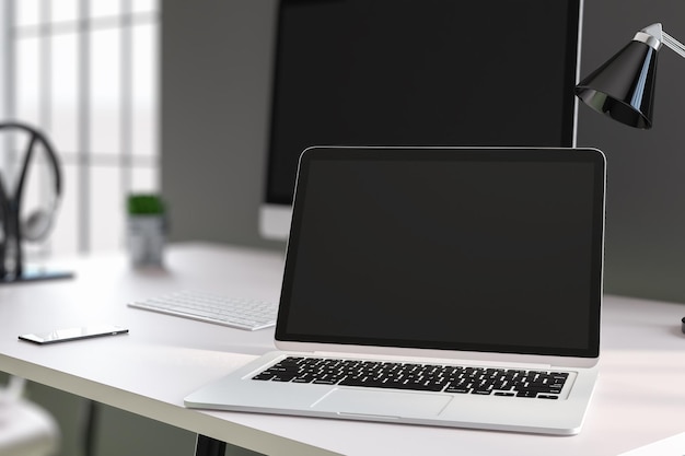 Photo designer desk with laptop