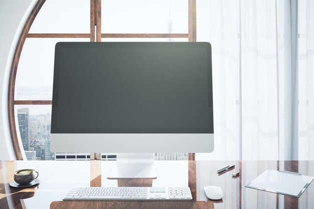 Designer desktop with blank monitor