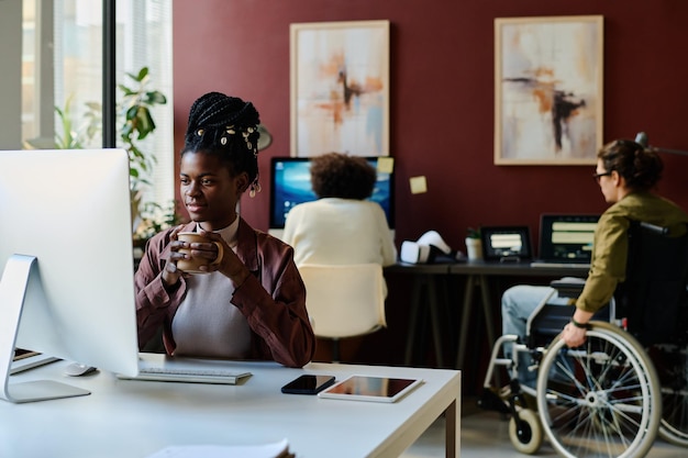 Designer looking at computer screen