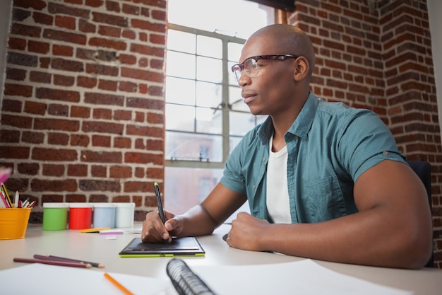 Designer sketching on graphics tablet