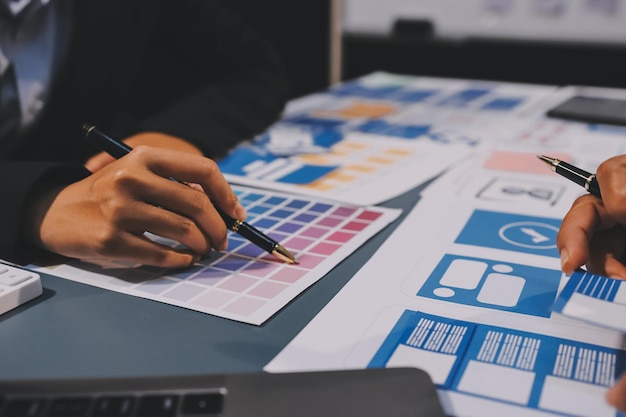 The designer team is designing the uxui system to make the uxui system work well on new phones and support system updates Website development concept UI UX front end designer