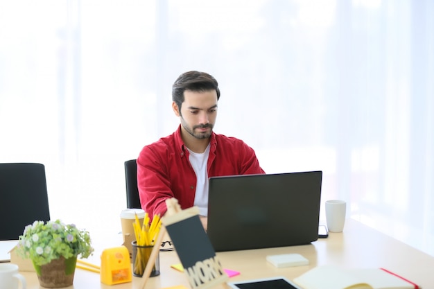 designer working  on laptop in office 