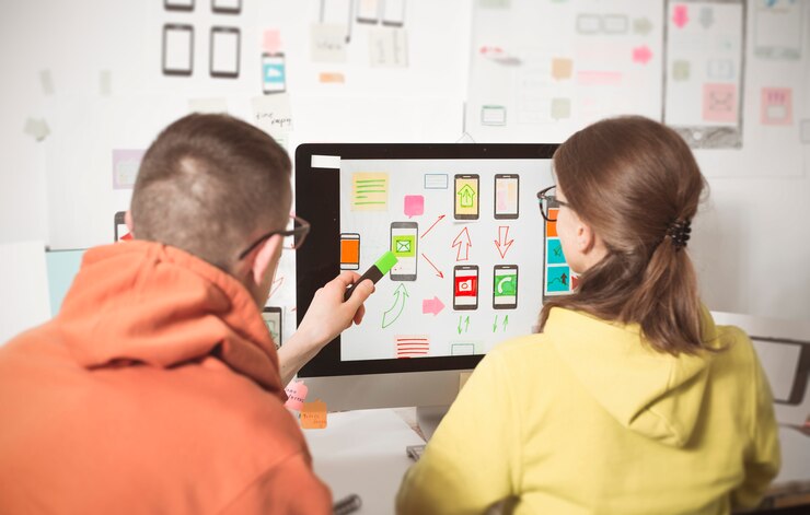Photo designers develops web applications for mobile phones. user interface for smartphones. 