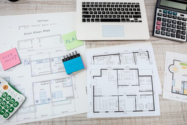 designers work as a team on drawings and designs of new house projects